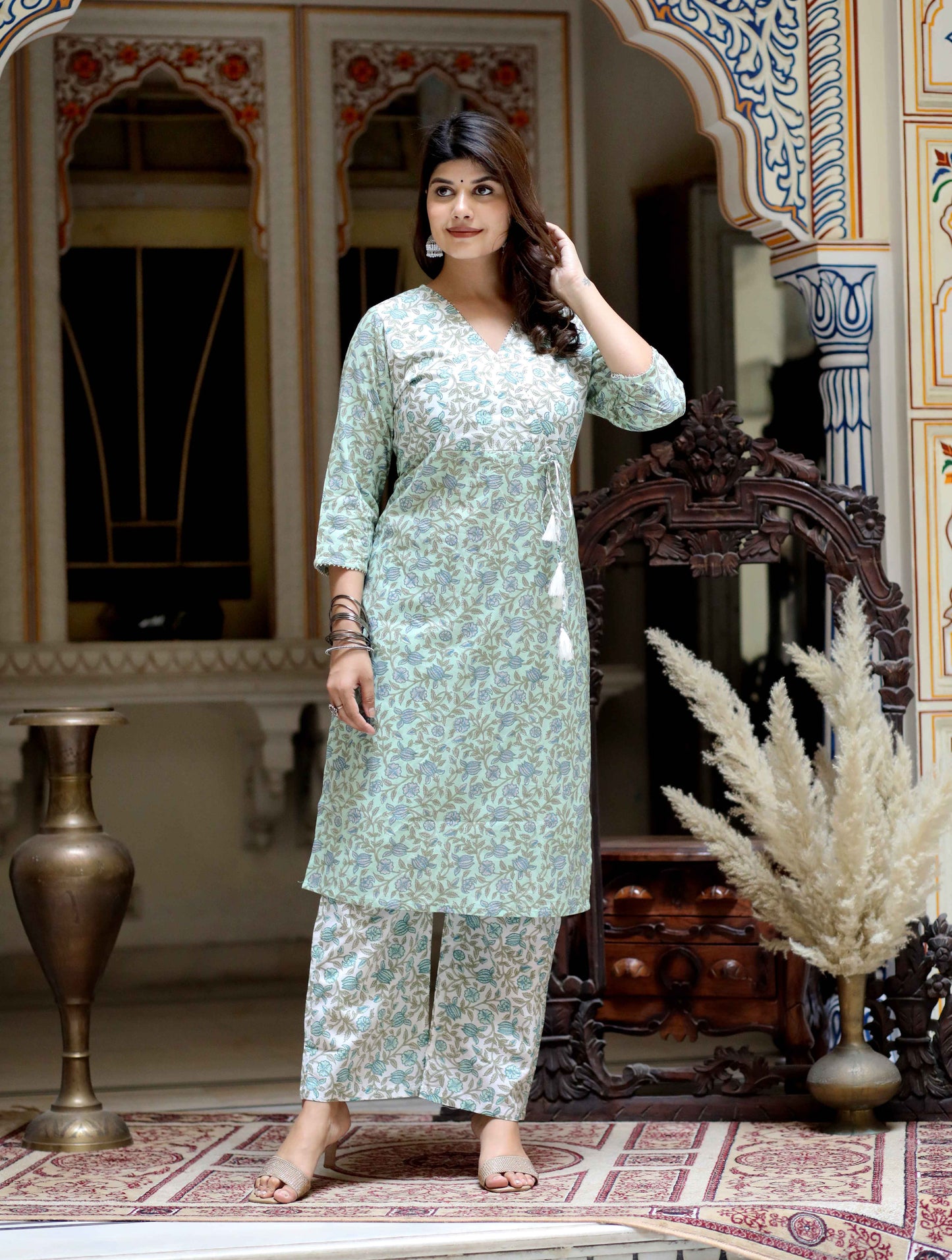 Women's Green Floral Jaipuri Cotton Kurta Palazzo With Tassel Set - Miravan